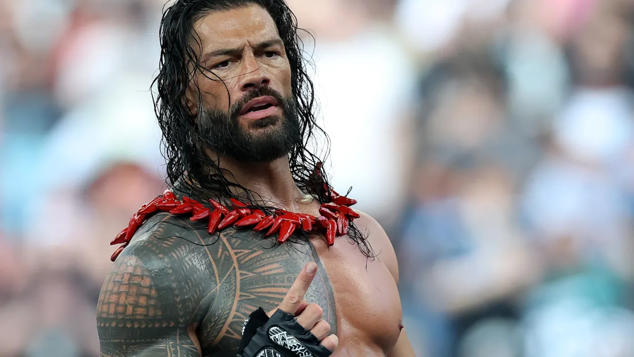 Roman Reigns Celebrates W W E Summer Slam Win