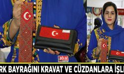Türk bayrağını kravat ve cüzdanlara işledi
